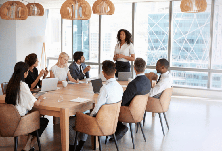 A group of people meeting in an office